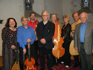 Fabian Peake (front), soprano Sue Mileham and Sebastian Peake (far right)